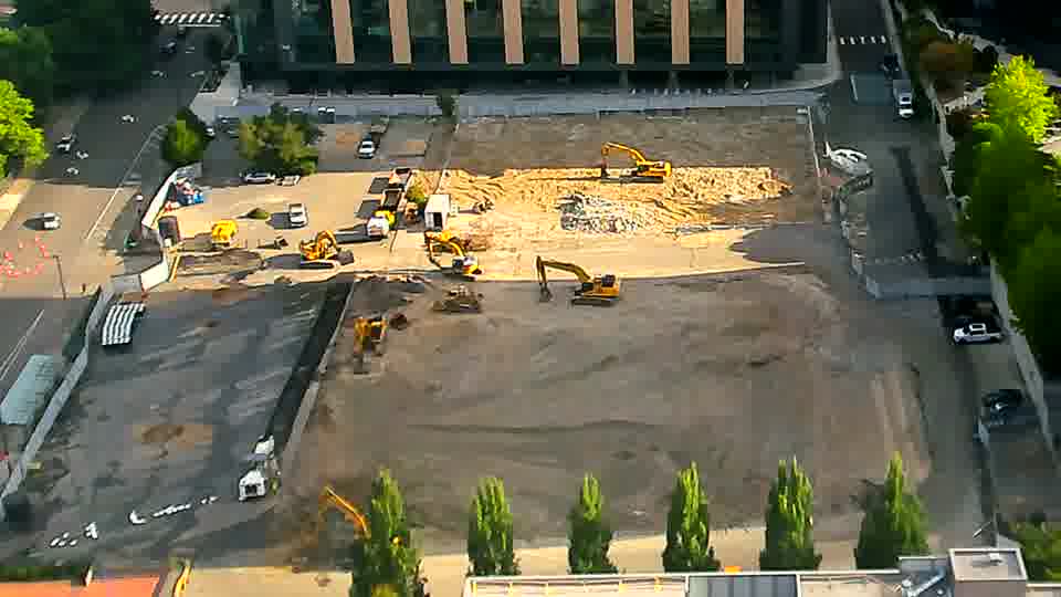 The site appears quiet, with the positions of the machines holding steady between these views.