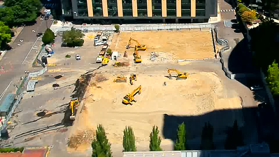 The equipment remains in generally the same locations as before, though a minor shift in the material arrangement is visible toward the foreground.