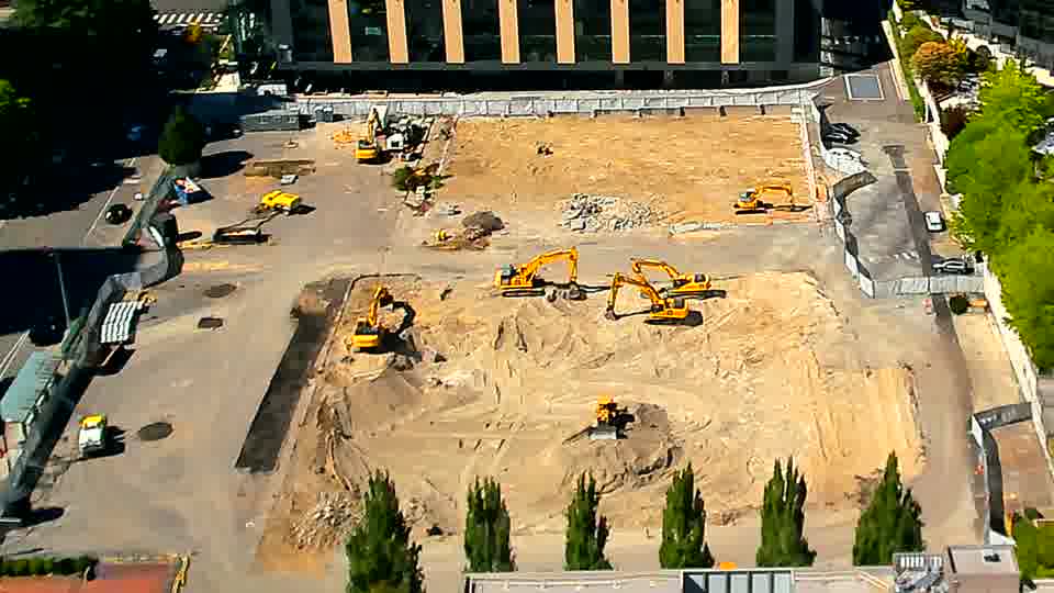 The site remains remarkably still, with the positions of the machines and materials appearing unchanged.