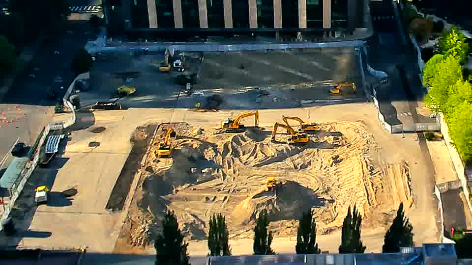 The scene presents a consistent picture, with equipment and material arrangements remaining virtually the same as before.