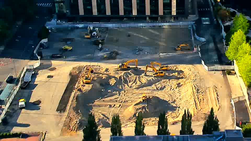 The site continues to show very little variation, with the equipment and material locations remaining essentially as they were.