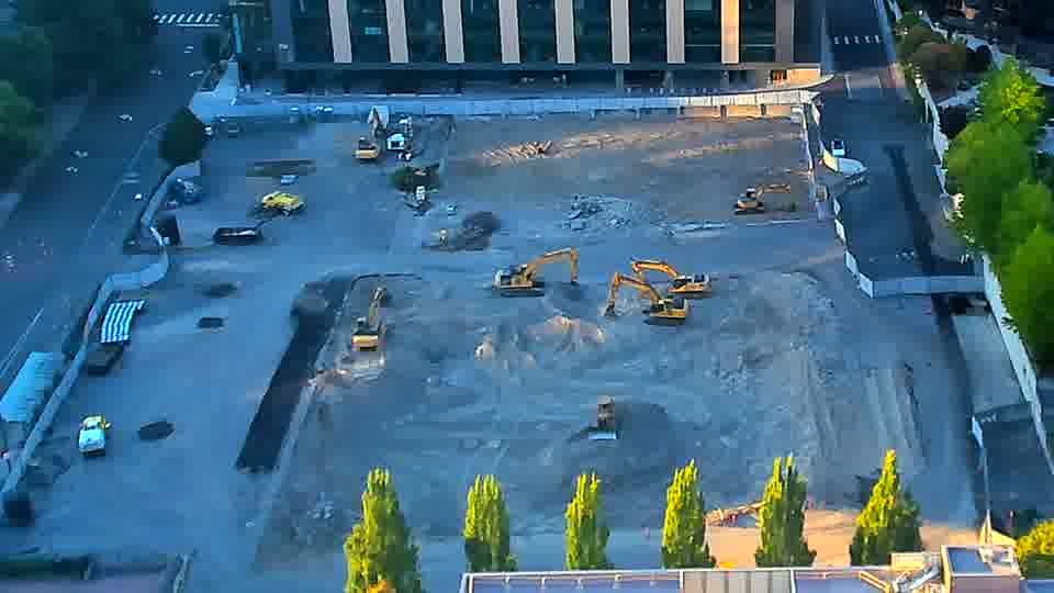 The scene remains quite still, with no apparent movement of machines or materials in the last fifteen minutes.