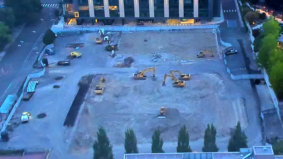 The scene remains largely as it was, with the heavy equipment distributed across the site.