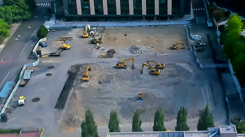 The scene remains largely unchanged, with equipment holding its positions across the site.