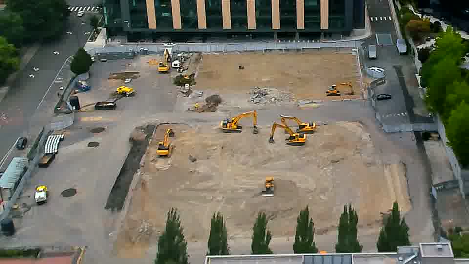 The scene appears stable, with the arrangement of the machines and materials showing no obvious alterations.