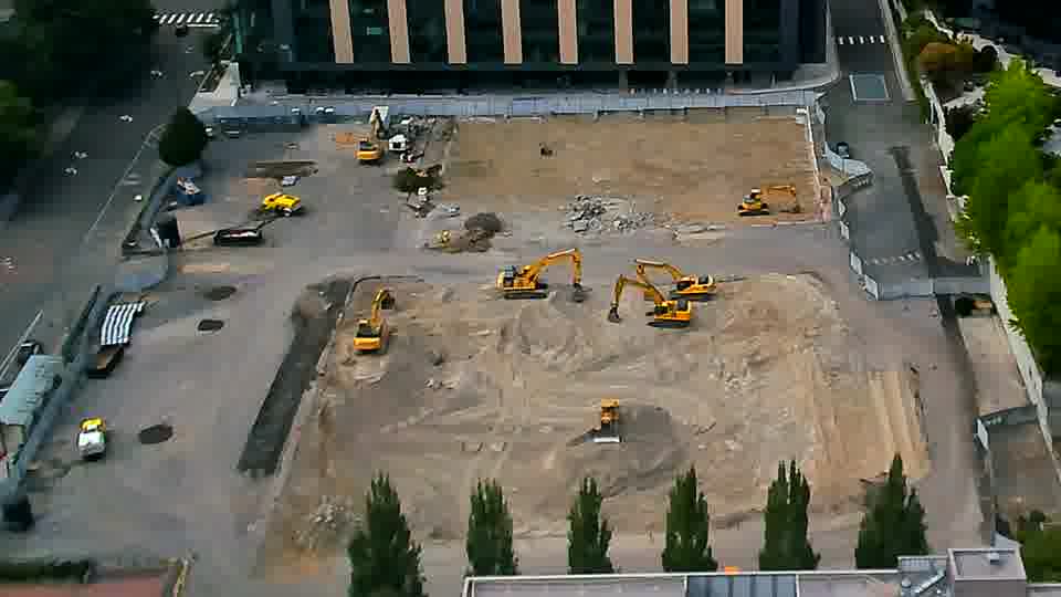 The scene is remarkably similar to the last check, with the equipment maintaining its general distribution across the site.