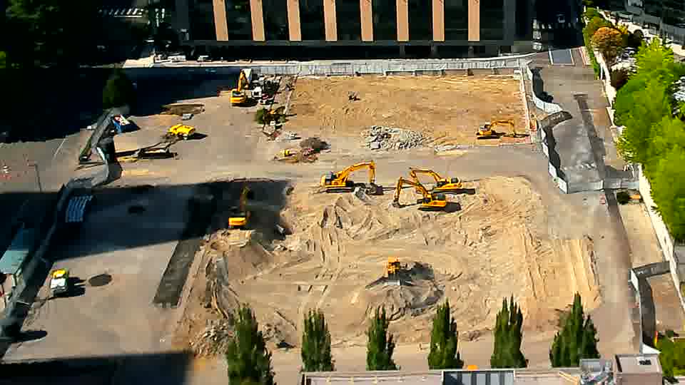 The machines on site haven’t noticeably shifted their positions in the last quarter hour.