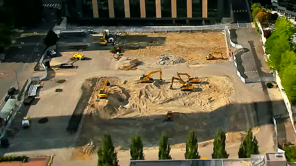The arrangement of equipment appears stable, though shadows have shifted slightly across the work area.