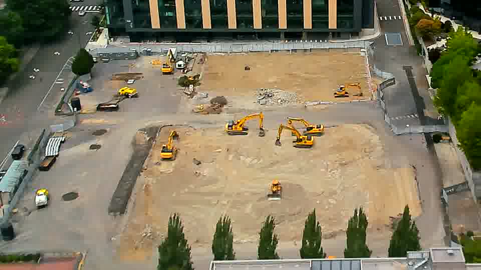 The equipment layout is remarkably unchanged, with all machines appearing to stay in place during this interval.