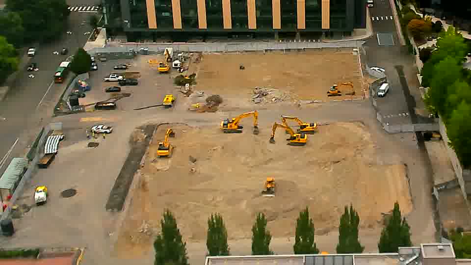 The scene appears stable, with the machinery maintaining its positions from fifteen minutes ago.
