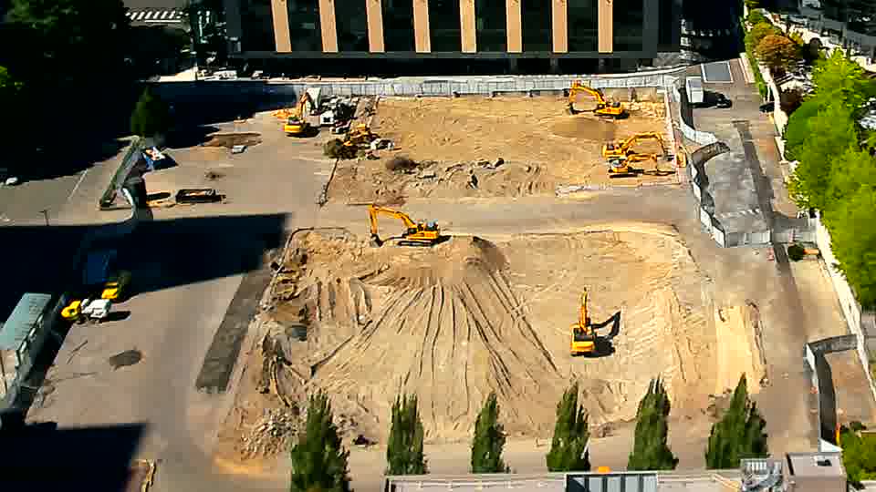 The work area shows no significant difference, with all visible machinery holding its place.