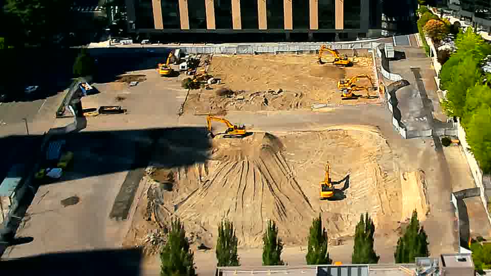 The layout of equipment remains consistent, with no identifiable movement of machines or material.