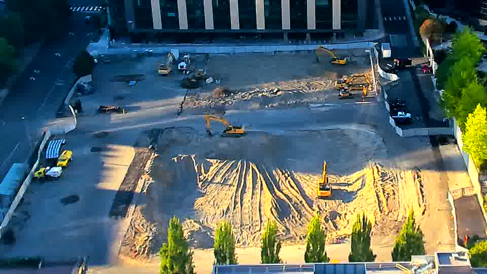 The arrangement of equipment across the site appears stable, with no noticeable shifts in position during the last fifteen minutes.
