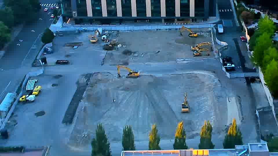 The site maintains its appearance, with no discernible movement of equipment or vehicles in the last fifteen minutes.
