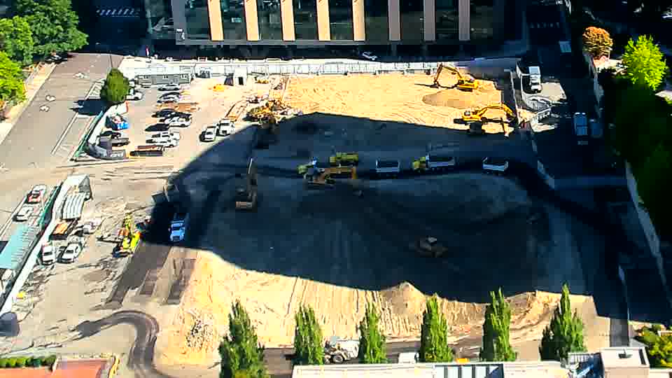 The scene remains largely unchanged, though shadows have shifted across the work area.