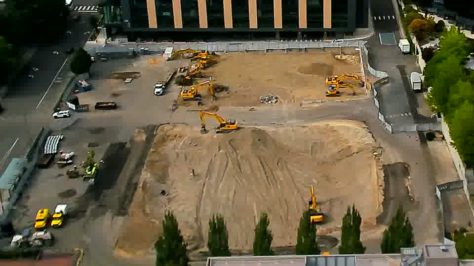 Equipment across the site remains in the same positions, and no vehicles have entered or exited during the interval.