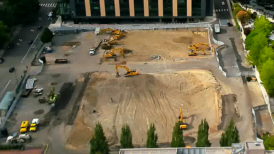 The site appears largely unchanged, with equipment remaining in the same spots and no new arrivals visible.
