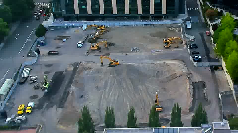 The scene appears stable, with the heavy equipment remaining in the same positions as before.
