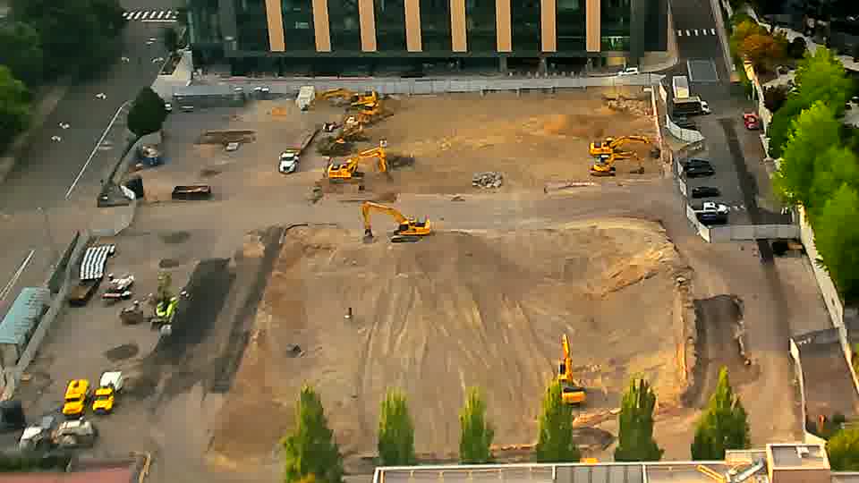 The arrangement of the machinery across the site looks remarkably similar to the previous view.