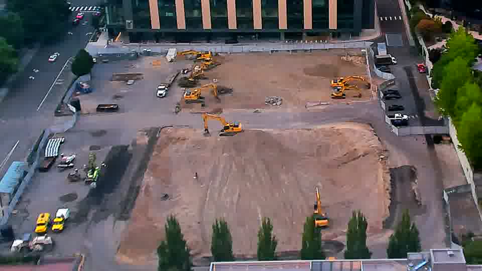 The equipment across the site remains in largely the same positions as the previous view.