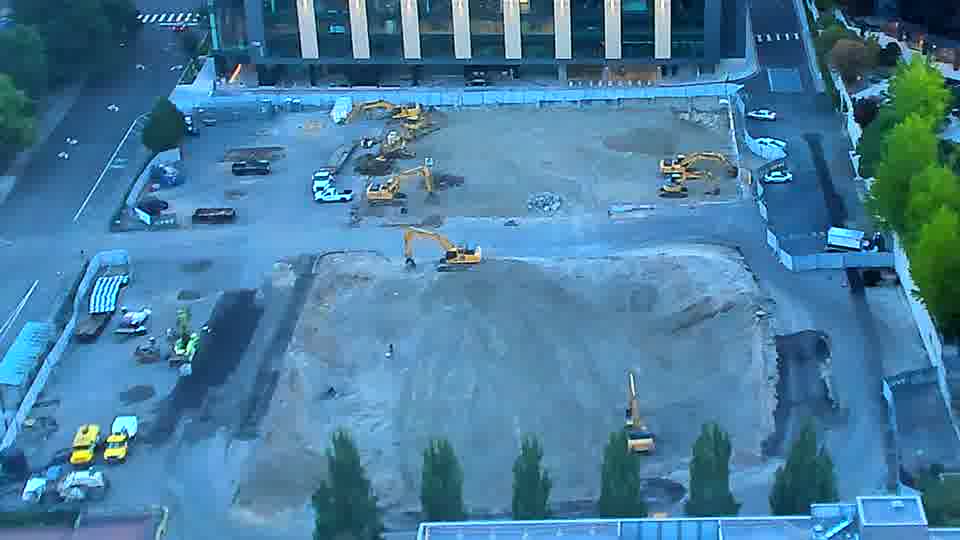 The scene appears static, with equipment holding its positions across the work area.