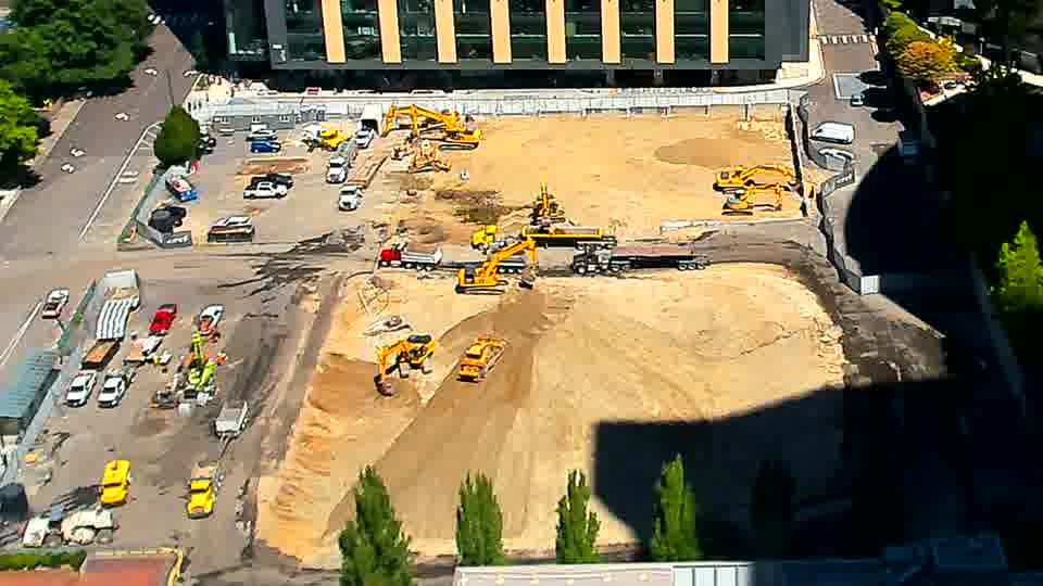 A slight repositioning of the excavator near the center shows it now facing more directly towards the northeast corner of the site.