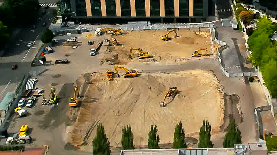 The equipment arrangement appears unchanged, though a small amount of material has been moved from the center toward the northeast corner.