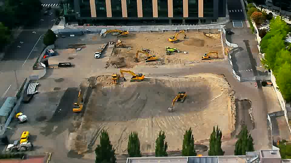 The arrangement of equipment across the site remains largely as it was, with no significant movement visible.