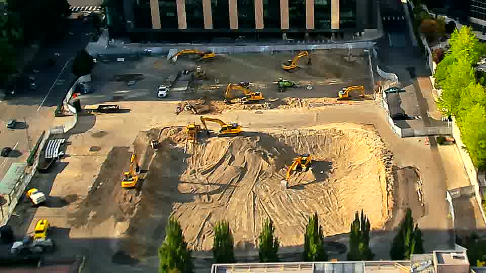 Activity on site is minimal, with the machines maintaining their prior locations and orientations.