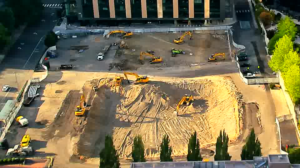 EverythingPSno movement is detected, as the machinery and material piles remain in their previous positions.