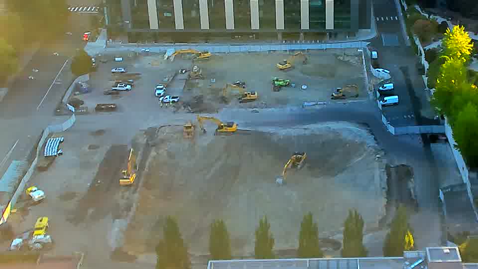 The scene presents a consistent view, and the arrangement of equipment across the site hasn't altered in the last quarter hour.