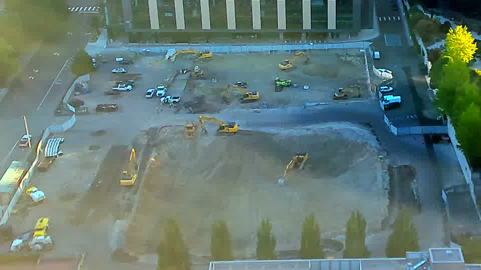 Everything on site remains in the same location as fifteen minutes ago, with no visible changes in equipment positioning.