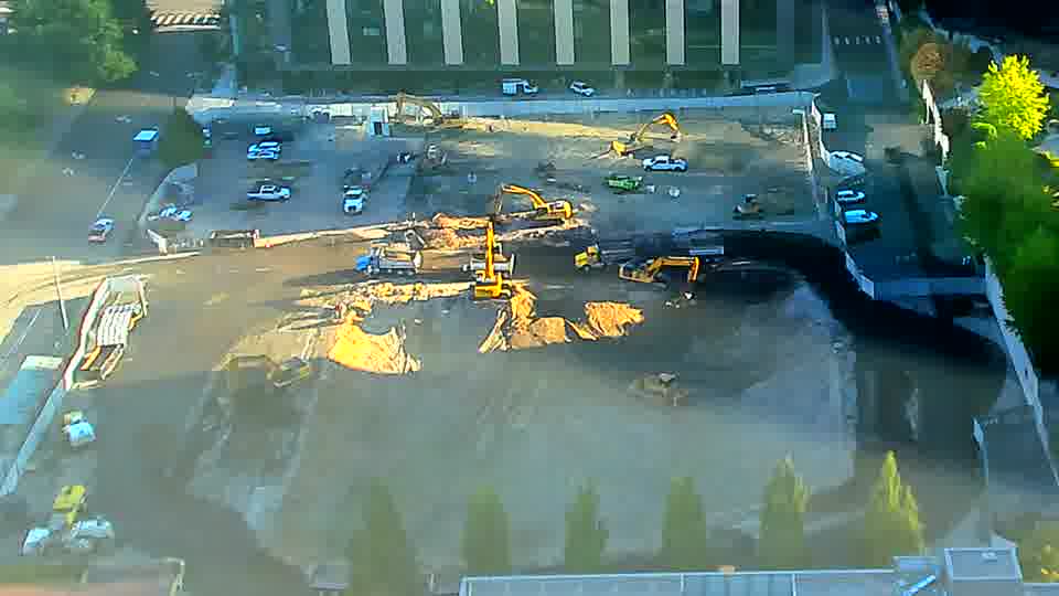 The scene appears largely unchanged, with equipment holding its positions across the block.