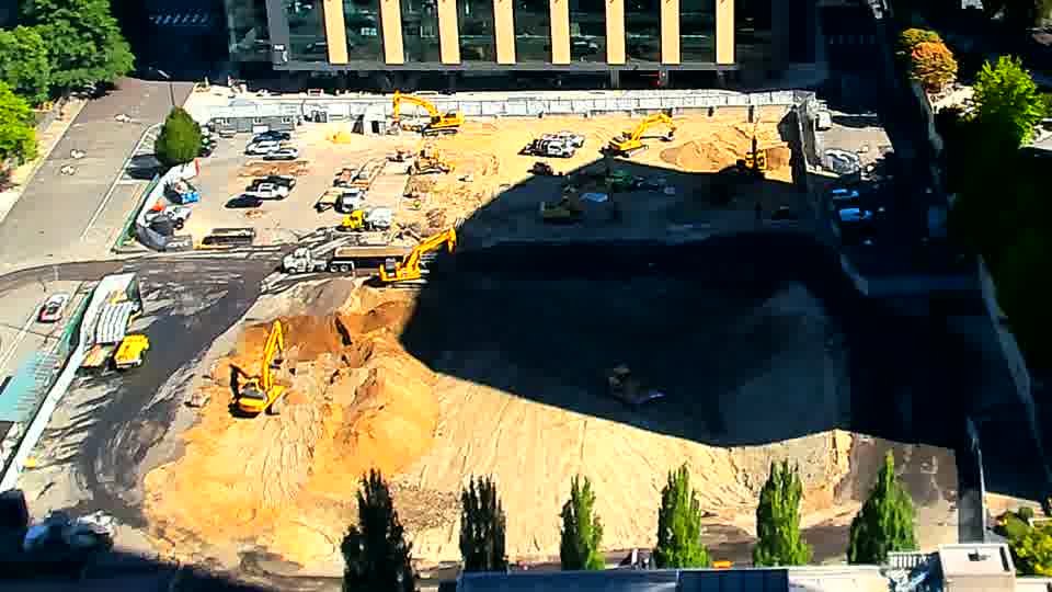 The scene remains quite stable, with no noticeable changes in the positions of equipment or vehicles.