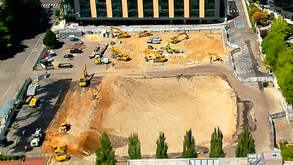 The overall scene remains quite similar, with no significant movement of equipment or materials readily apparent.