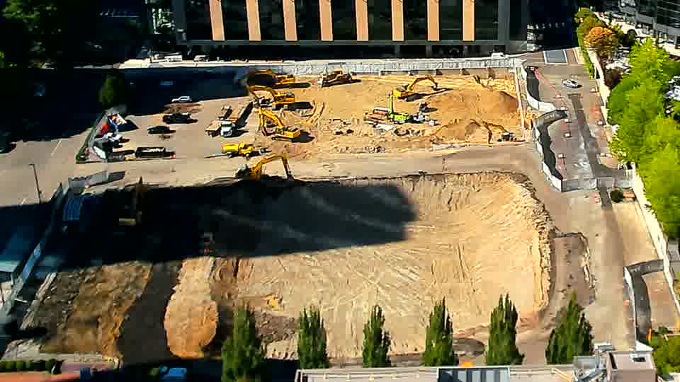 The overall layout of the site appears unchanged, with all visible machinery holding its previous location.
