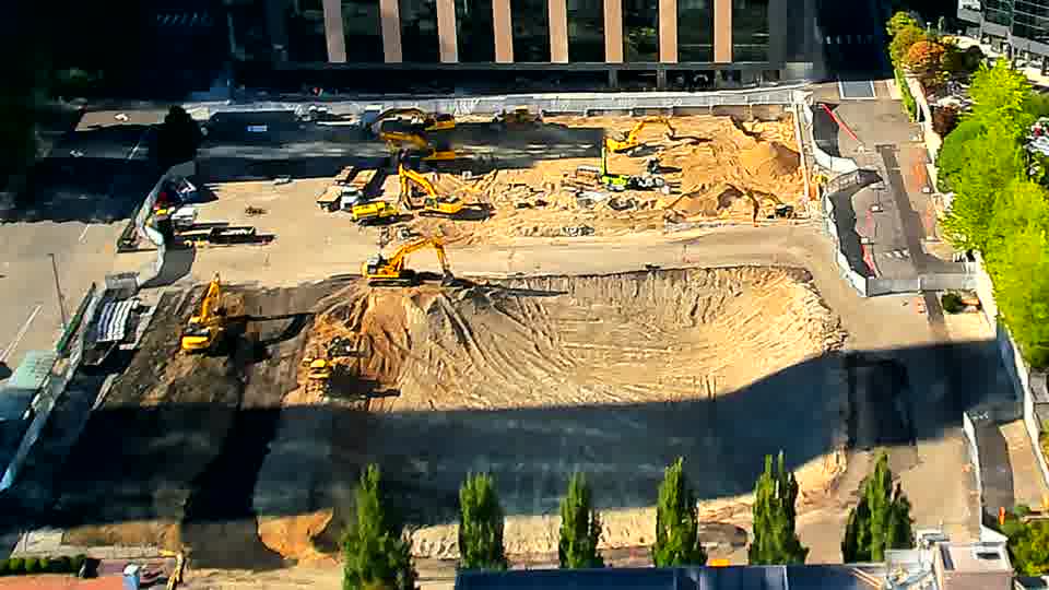 The arrangement of machinery across the site continues without apparent alteration.