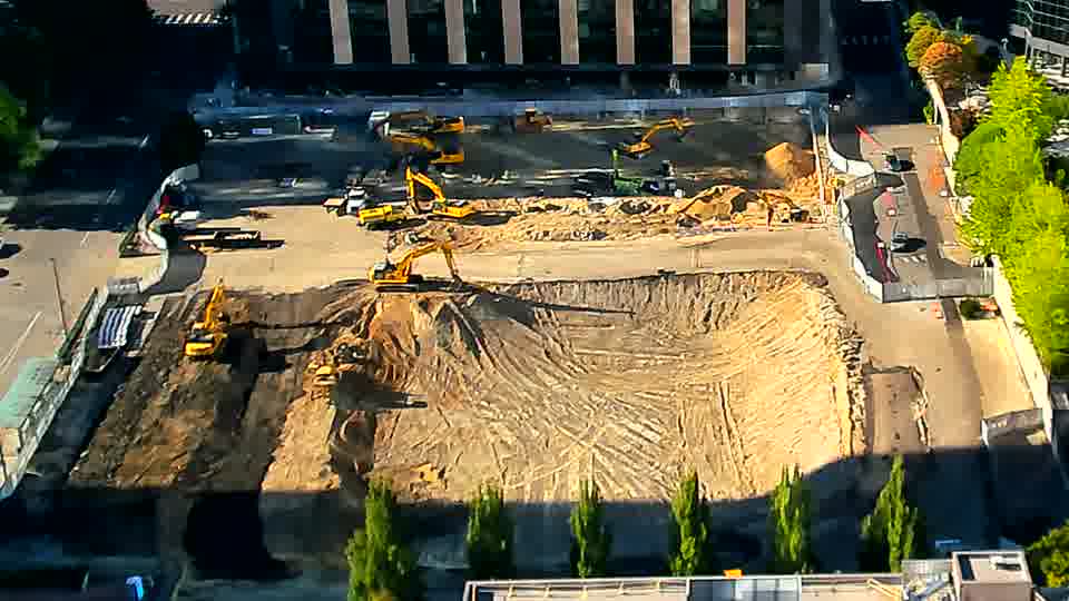 The machines on site haven't shifted position, maintaining the same layout as before.