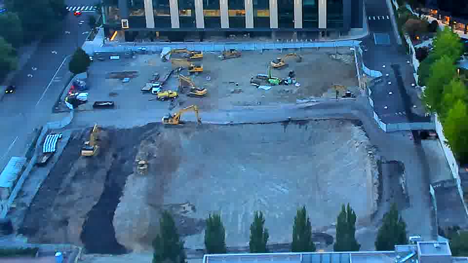 The site maintains a stable appearance, with no apparent shifts in equipment positions or material stockpiles.