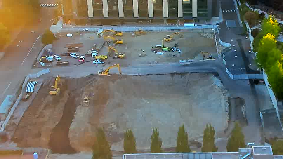 The site appears quiet, with no noticeable change in equipment positions or activity between these views.