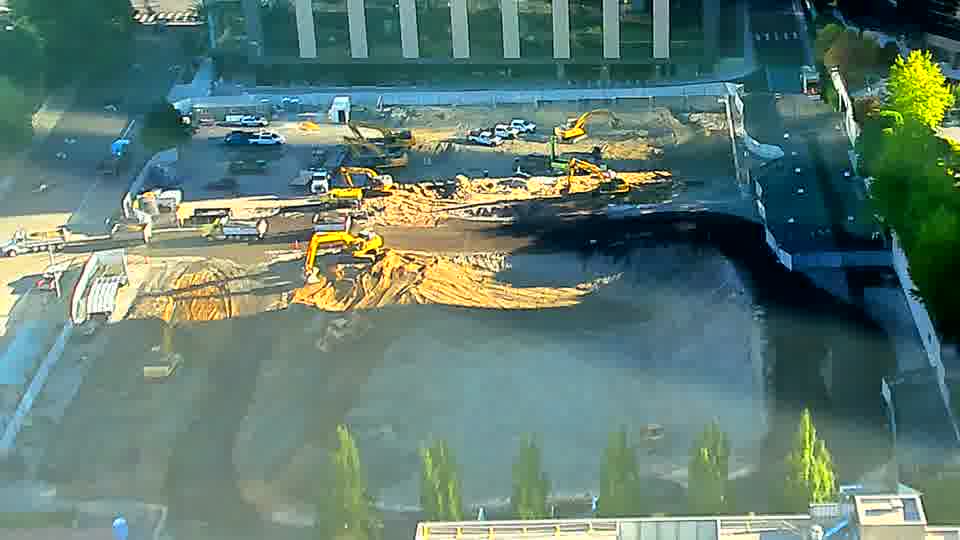 The scene remains largely as it was, with no significant alterations to equipment placement or ongoing work visible.