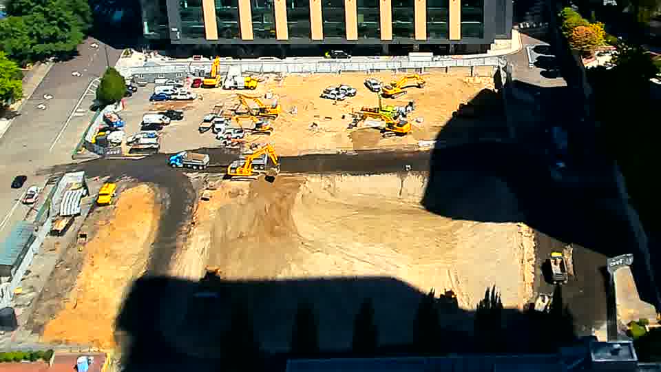 The scene remains very similar to the previous view, though the sunlight has continued to shift and shadows have grown longer.