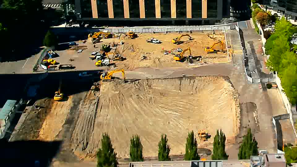 The arrangement of equipment across the site appears nearly identical to the previous view, though the color of the earth in the lower-right corner seems slightly lighter.