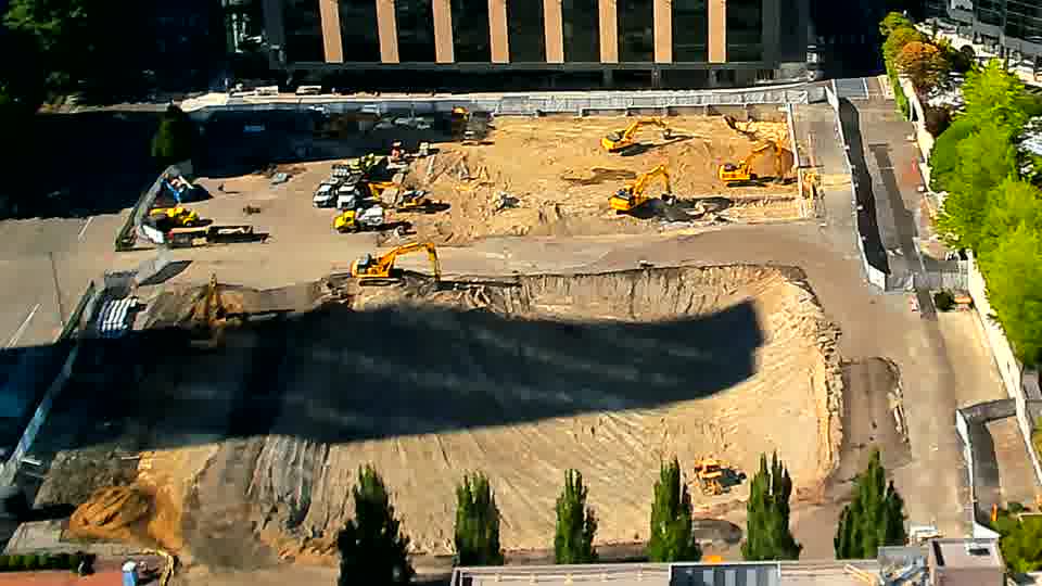 One of the excavators near the center of the site has shifted its position slightly. Otherwise, the scene maintains its largely unchanged appearance.