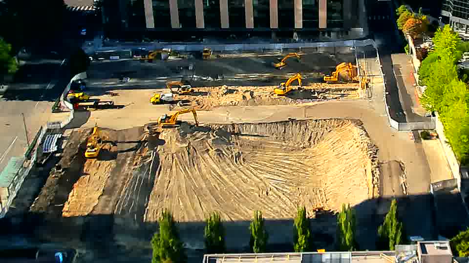 The arrangement of equipment appears virtually unchanged, though shadows have shifted slightly across the site's surface.