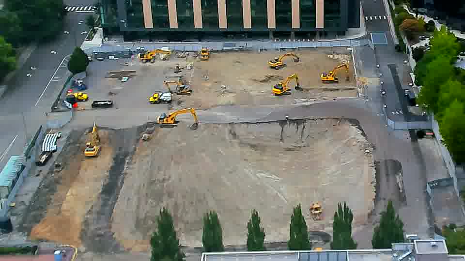 Equipment across the site maintains its positions, showing no significant shift in arrangement during this period.