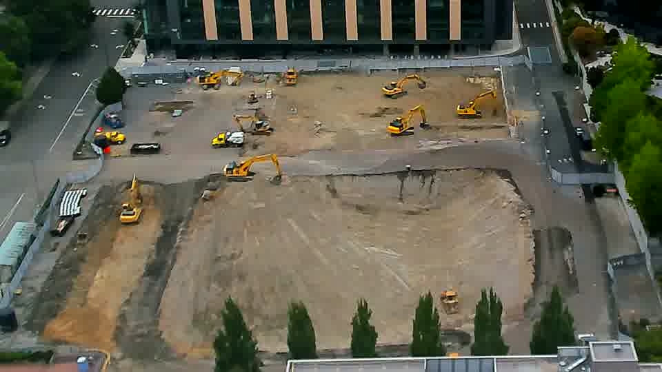 The scene remains remarkably still, with equipment holding its prior locations across the site.
