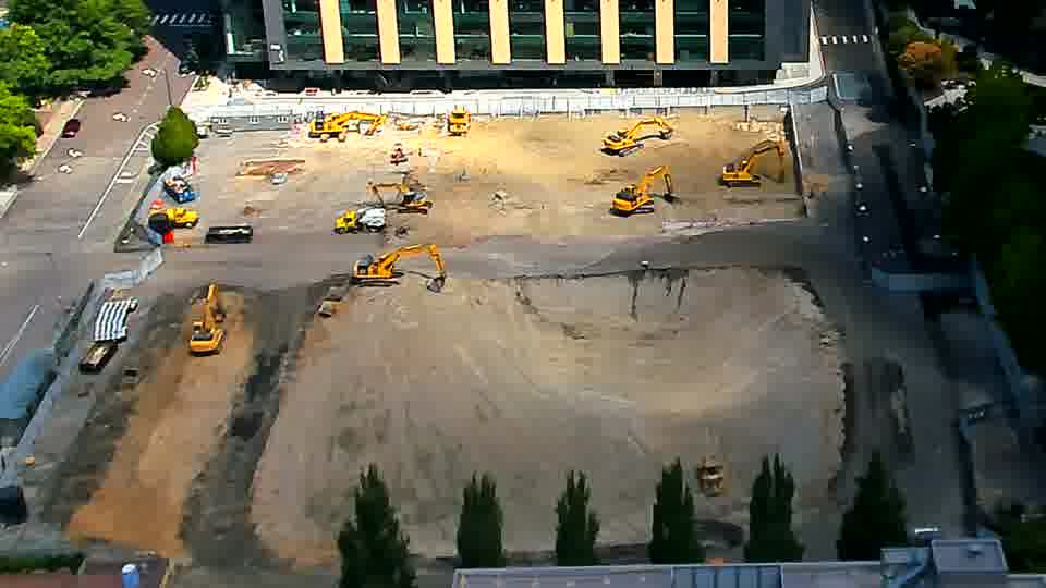 The site appears quiet, with the arrangement of machinery holding relatively consistent between views.