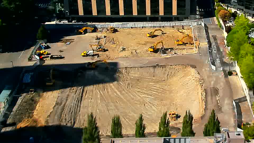 The layout of equipment on the site appears to be holding its position, with no discernible changes over the last quarter hour.