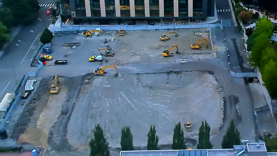 The overall scene is remarkably similar, with no obvious shifts in the location of equipment or materials.